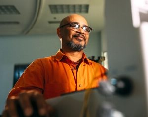 Canva Man Wearing Eyeglasses Facing Computer